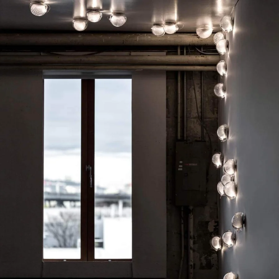 Distinguished Bocci 76 Surface Light lamp with strata of white and clear glass plus embedded copper mesh