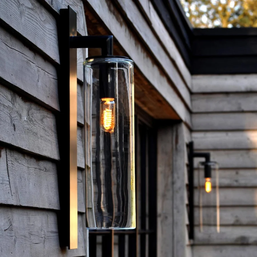 Sophisticated Royal Botania Dome wall lamp crafted in black powder-coated aluminum with a clear glass shade and warm 2700K LED filament bulb