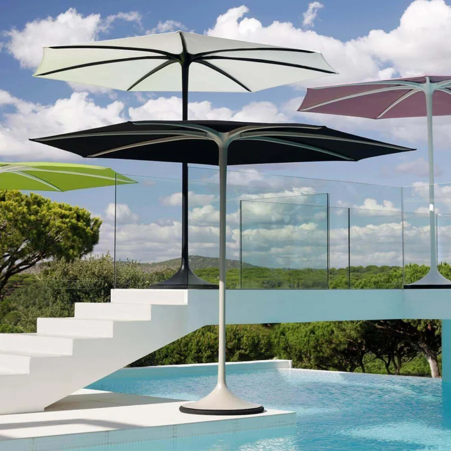 Innovative Royal Botania Palma umbrella, a strutless shade built with green Textile Cat fabric and a matte coated aluminum pole