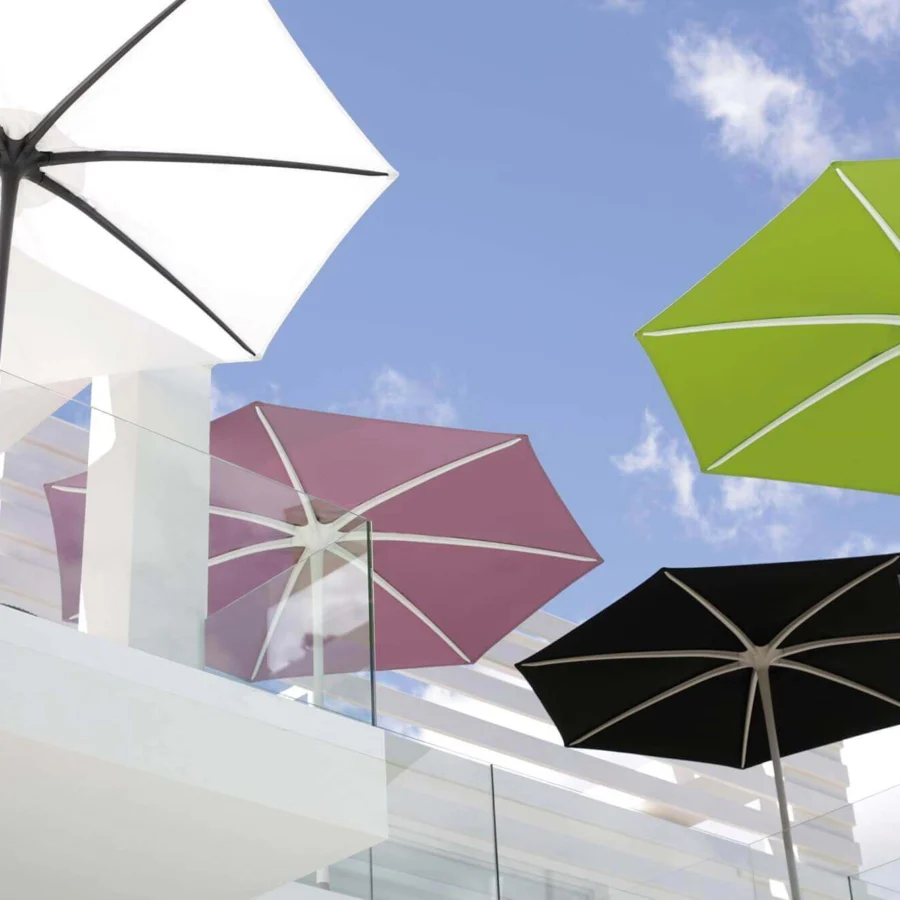 Superior Royal Botania Palma umbrella, a strutless shade with black acrylic textile and aluminum pole built with a powder-coated finish