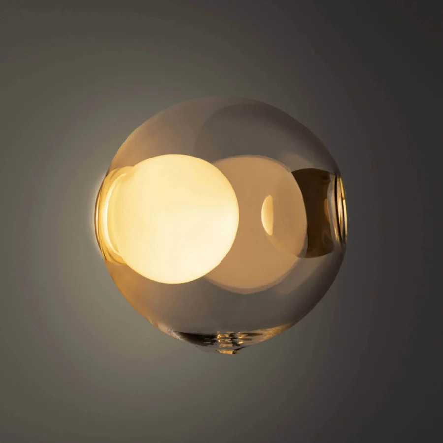 Distinguished Bocci 28s lamp crafted in clear glass with a milk white interior and satin metal mounting