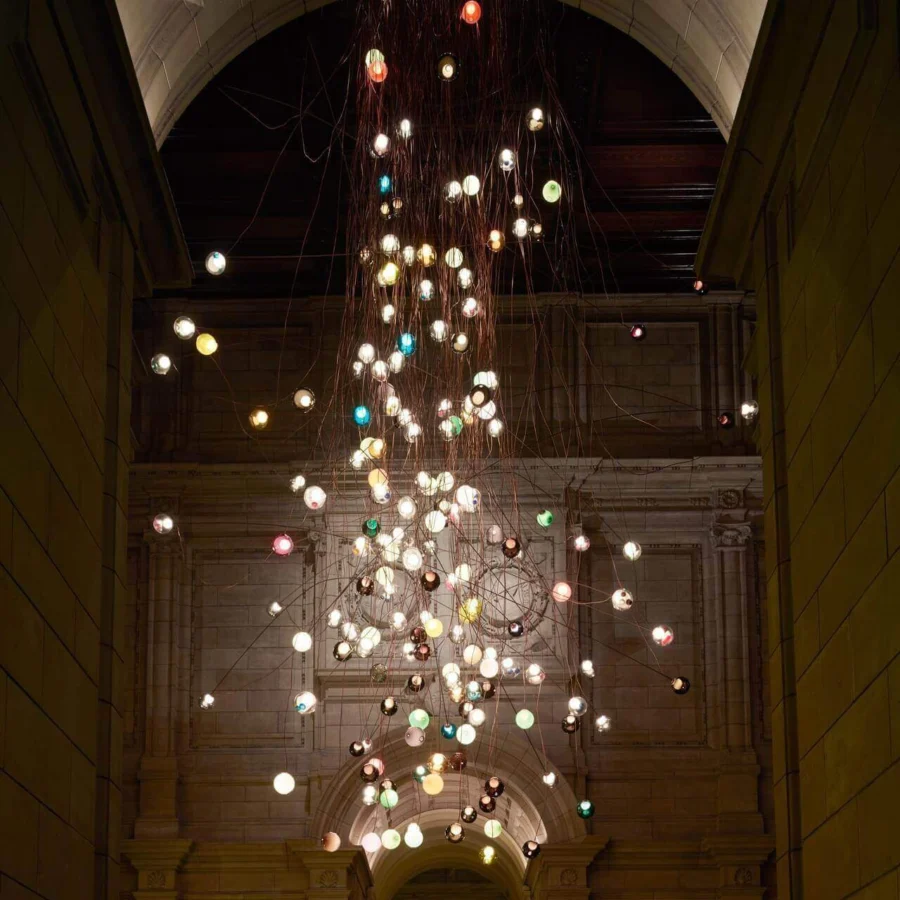 Distinguished Bocci 28 Copper suspension lamp with hand-blown glass spheres and natural copper components crafted with clear exteriors and milk white interiors