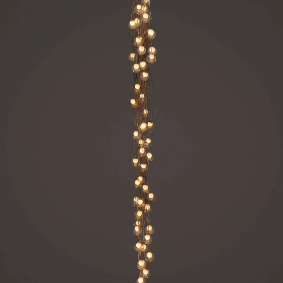 Exceptional Bocci 28 Copper suspension lamp crafted in clear glass with delicately branching matte copper rods registering natural weathering