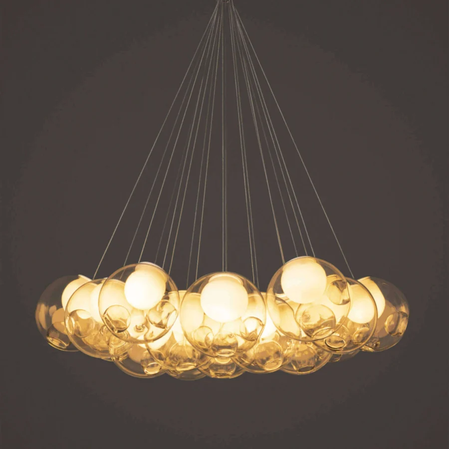 Captivating Bocci 28 Cluster suspension lamp with clear glass spheres and milk white interior lamp holder cavities crafted with silver-toned cables
