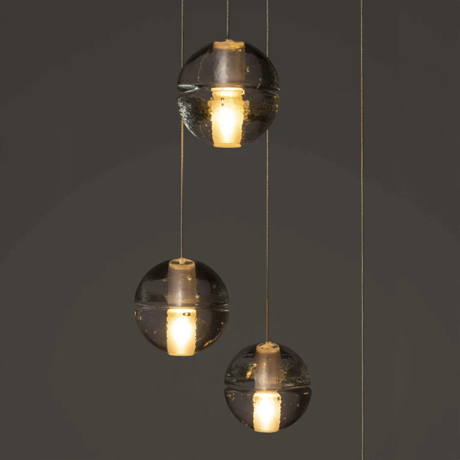 Captivating Bocci 14 Random suspension lamp with articulated cast glass sphere and frosted cylindrical void in translucent tones