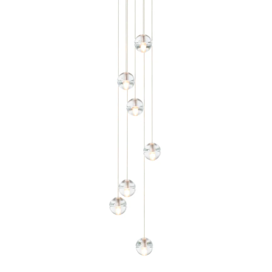 Exclusive Bocci 14 Random suspension lamp with articulated cast glass spheres and frosted cylindrical voids within transparent shades