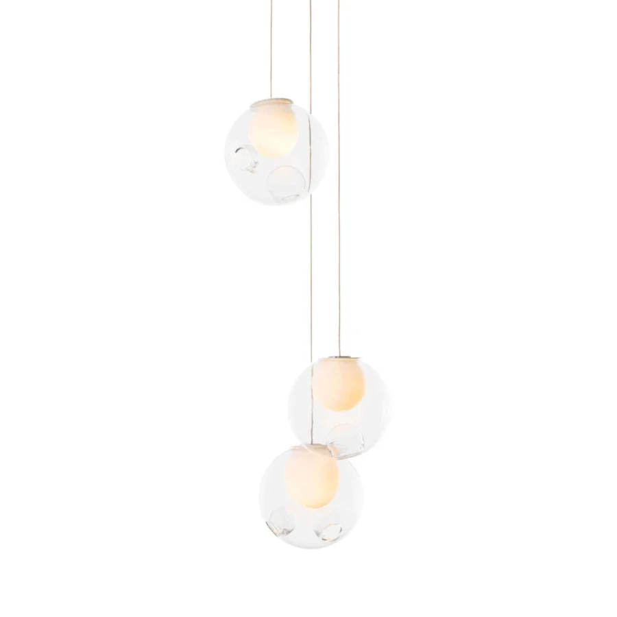 Exceptional Bocci 28 Random suspension lamp crafted with clear glass exterior and milk white interior cavities exhibiting refined distortion
