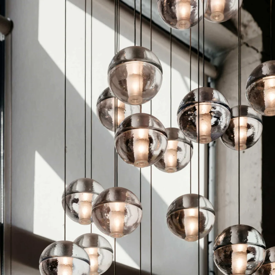 Exceptional Bocci 14 Random Suspension lamp with cast glass sphere and frosted cylindrical void in silver-toned mirrored finish