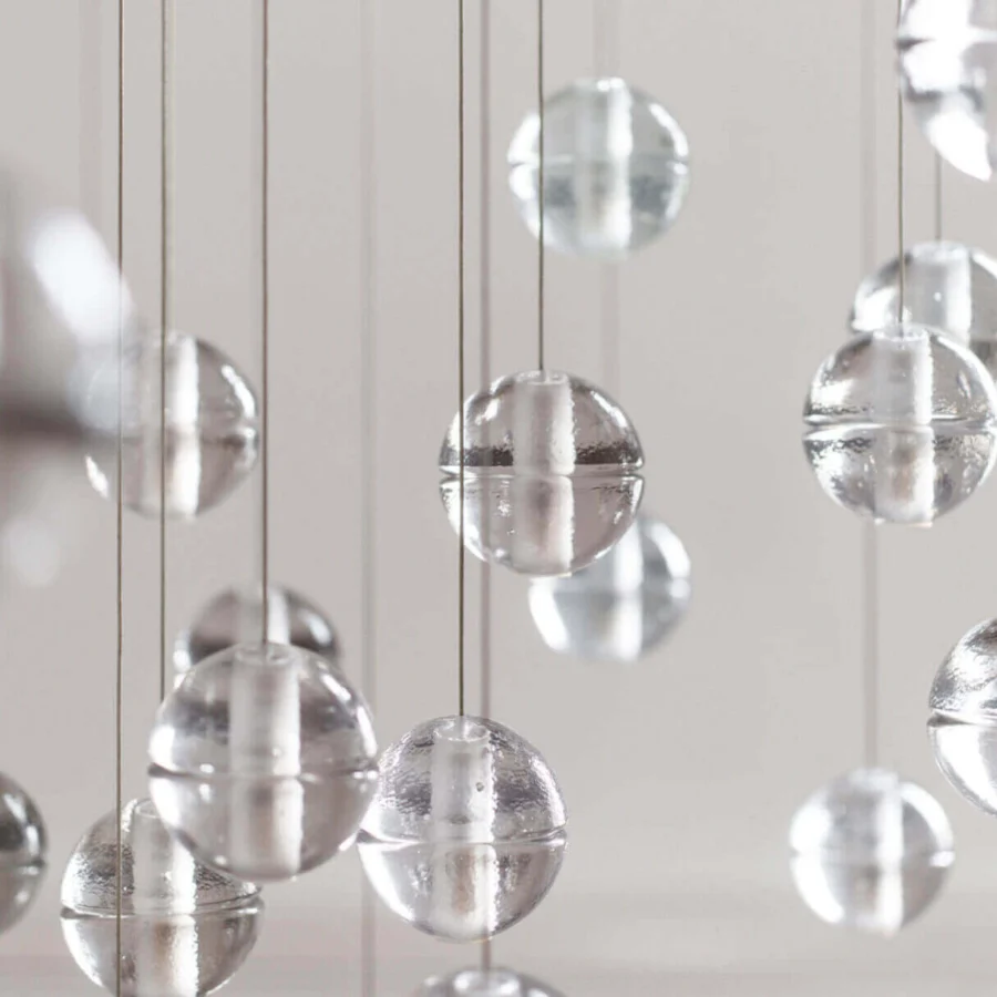 Distinguished Bocci 14 Random Suspension lamp with articulated cast glass spheres in silvery-grey and clear tones crafted with a frosted cylindrical void