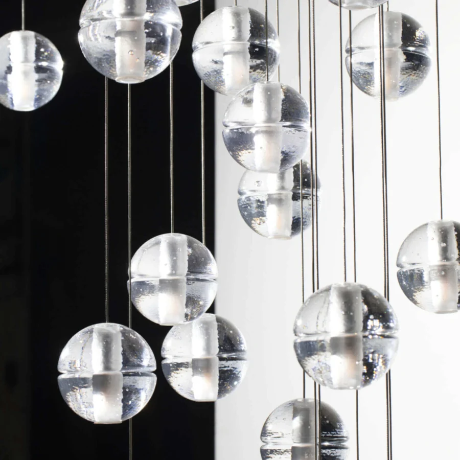 Superior Bocci 14 Random Suspension lamp with articulated cast glass spheres and dark suspension cords in translucent glass