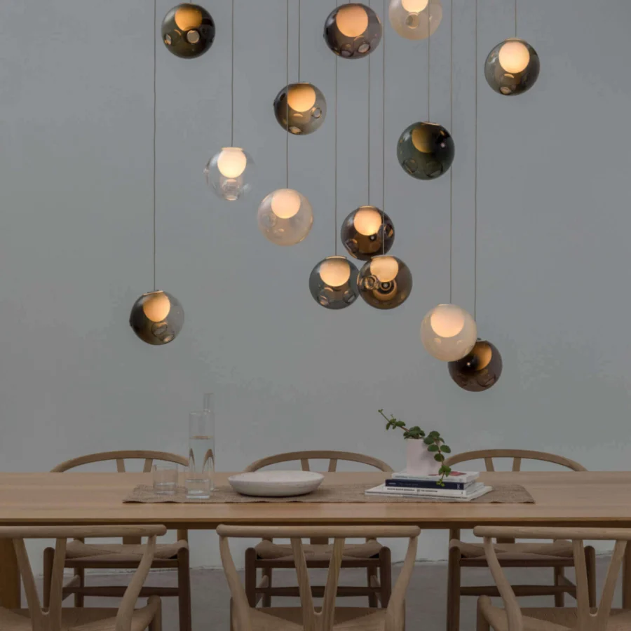 Distinguished Bocci 28 Random suspension lamp crafted in clear glass with milk white interior and satin metal canopy