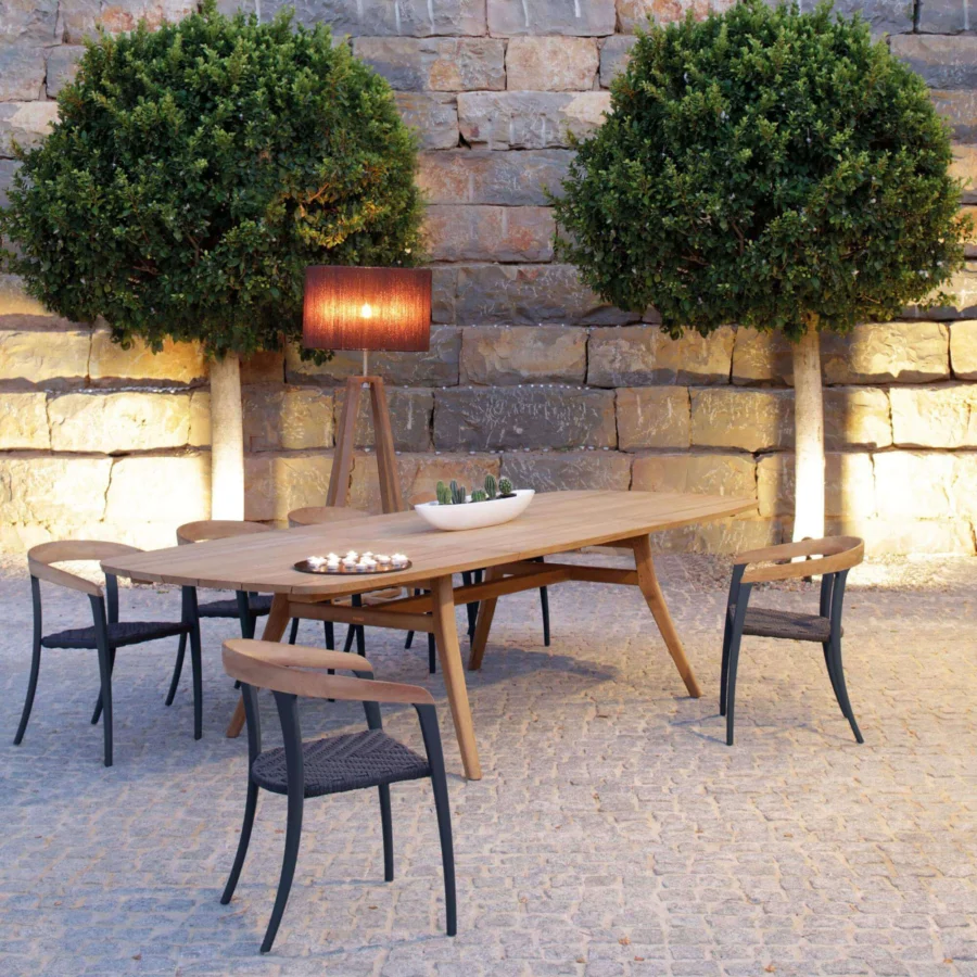 Distinguished Royal Botania Club floor lamp with teak wood and electro-polished stainless steel frame, complemented by a beige textile lampshade