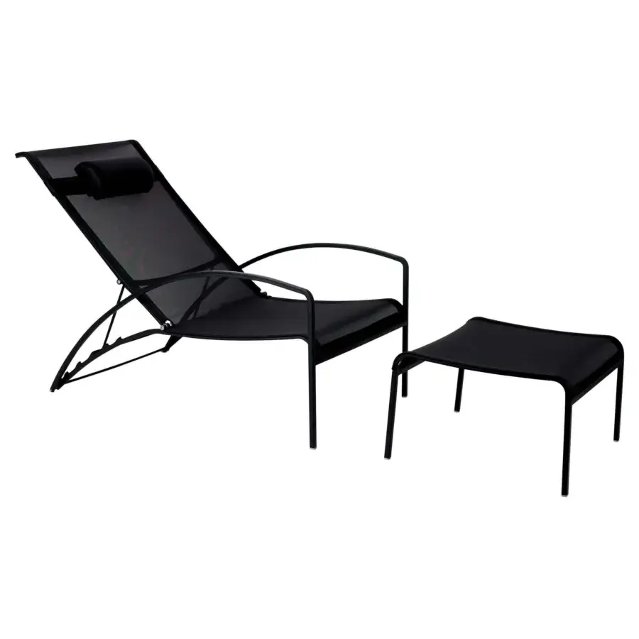 Exceptional Royal Botania QT lounger with black Batyline seat and brushed stainless steel frame built with a cylindrical head cushion