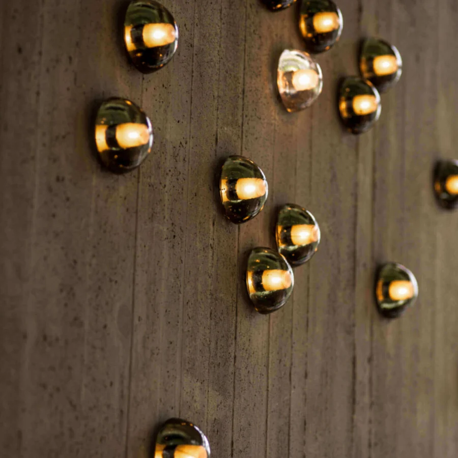 Superior Bocci 14 Surface Mount wall lamp with cast glass half-sphere and frosted cylindrical void in dark amber tones