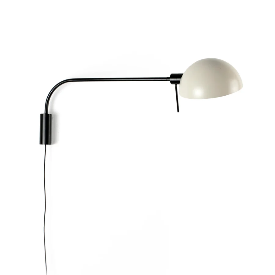 Wall lamp by Faro Barcelona in steel with a matte black frame plus a cream hemispherical shade on a pivoting…