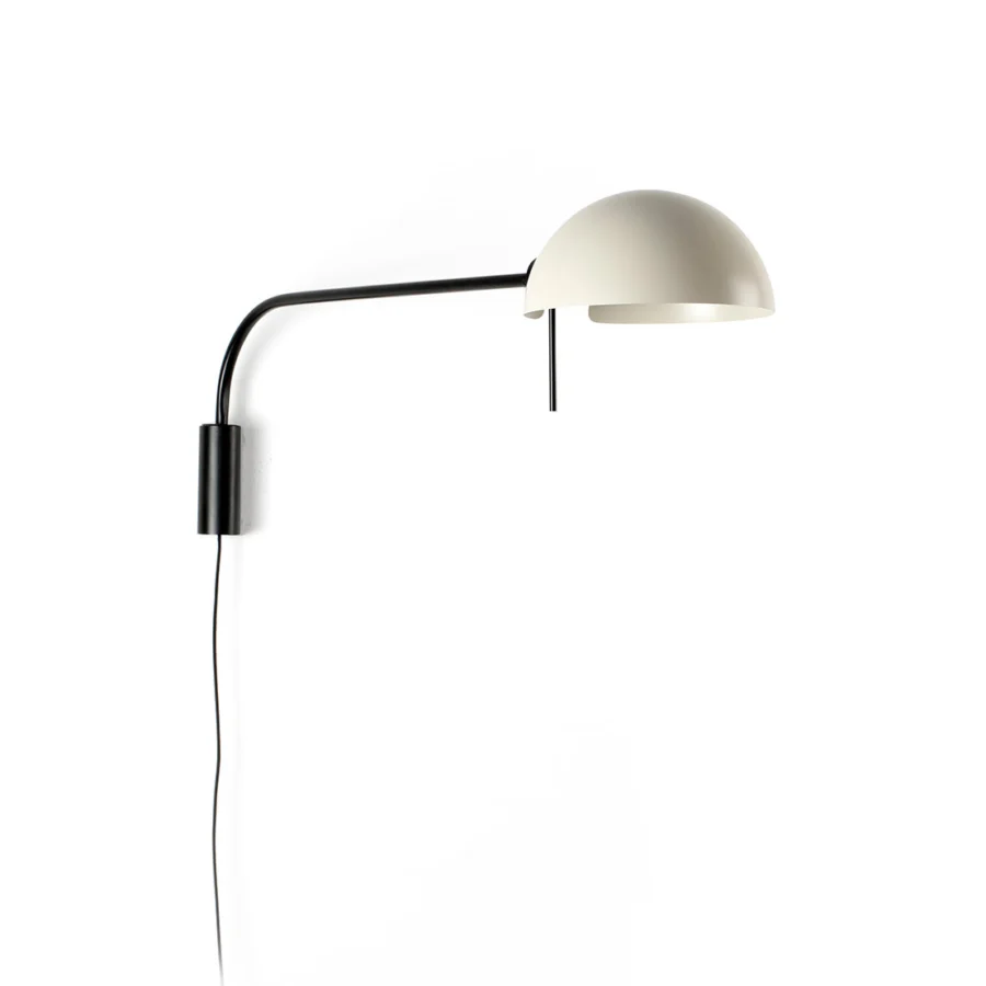 Wall lamp by Faro Barcelona in steel, featuring an off-white hemispherical shade alongside a tubular arm and base with a…
