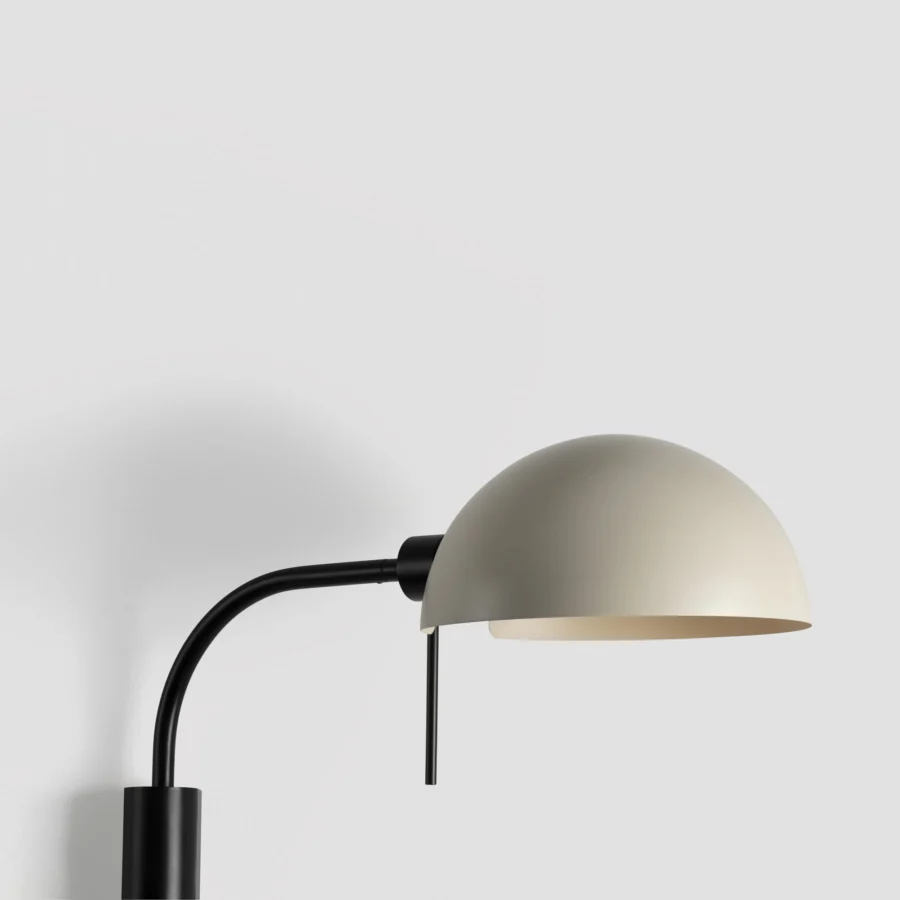 Wall lamp by Faro Barcelona in steel with off-white and black matte finish, featuring articulated arms and dome shade