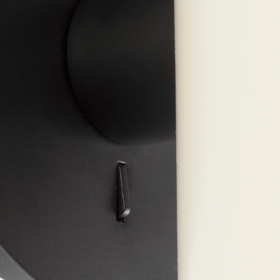 Wall lamp by Faro Barcelona with steel structure in matte black finish plus off-white diffuser and vertical toggle switch