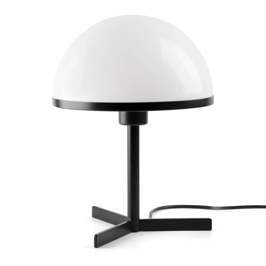 Table lamp by Faro Lab with opaque white opaline diffuser and metal structure in a matte black finish on cross…