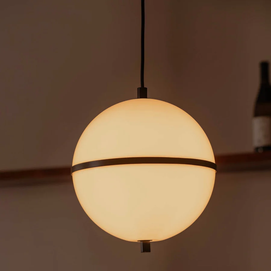 Suspension lamp by Faro Barcelona with a spherical translucent glass shade and matte dark metal center ring plus hardware