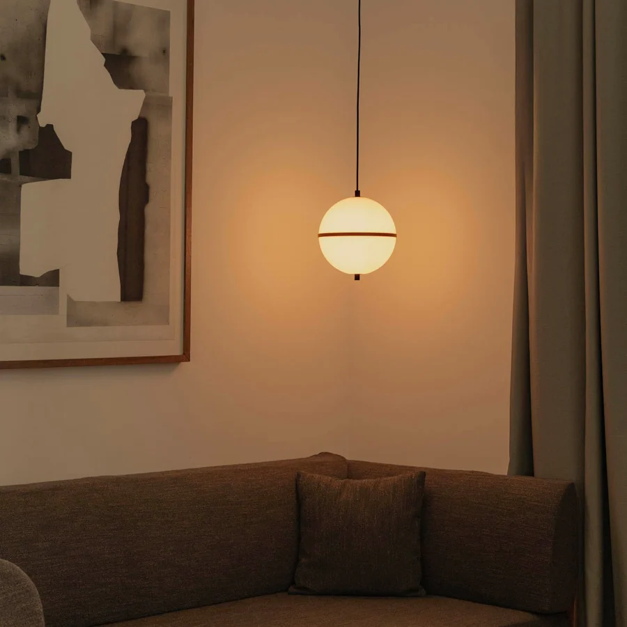 Suspension lamp by Faro Barcelona featuring glass shade in matte white with dark metal band and opaline diffuser