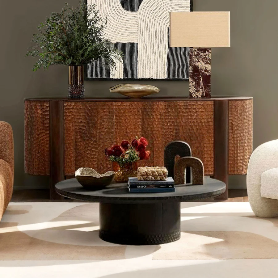 Coffee table by Dovetail Wilber in black mango wood with hand-carved textured finish on circular top plus pedestal base