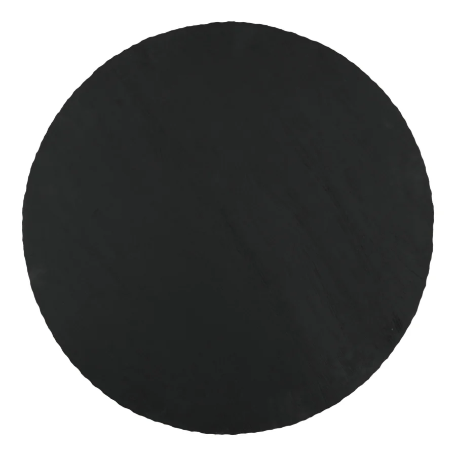 Coffee table by Dovetail Wilber in mango wood with a matte black finish, circular low profile and smooth grain texture