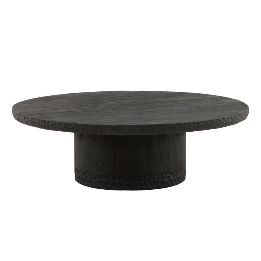 Coffee table by Dovetail Wilber in black mango wood with a matte textured finish, cylindrical pedestal and carved detail
