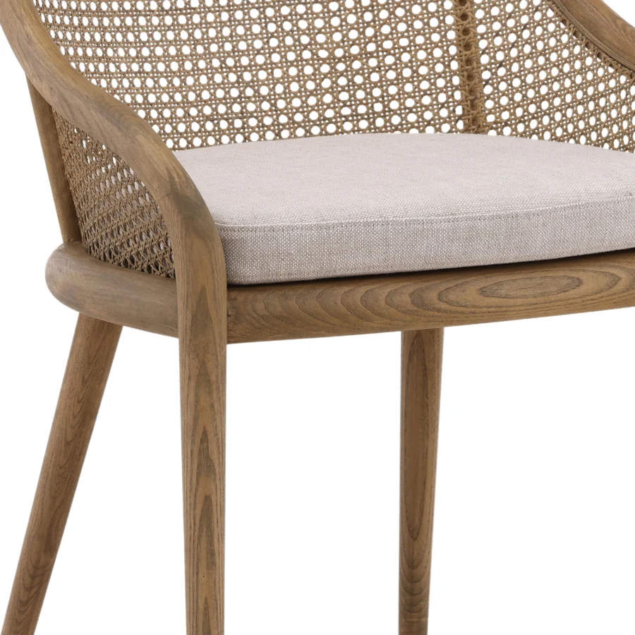 Armchair by Dovetail Arcata in medium brown ash wood with matte finish, woven rattan cane panels and beige linen cushion