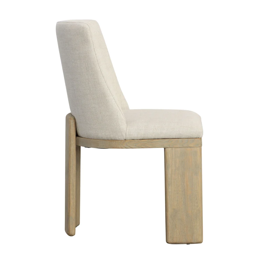 Dining chair by Dovetail Alistar with light warm wash ash wood frame and neutral beige linen upholstery on angled backrest