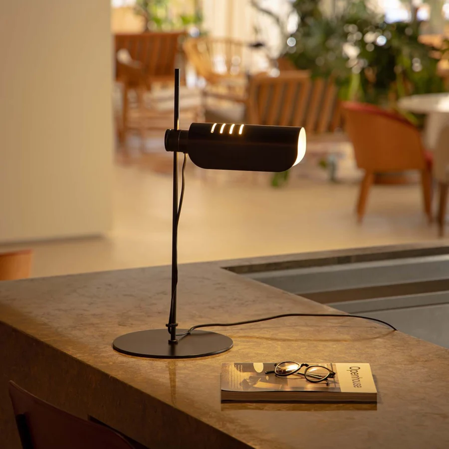 Table lamp by Faro Barcelona in metal with matte black finish, showing asymmetrical stem plus adjustable slit cylinder