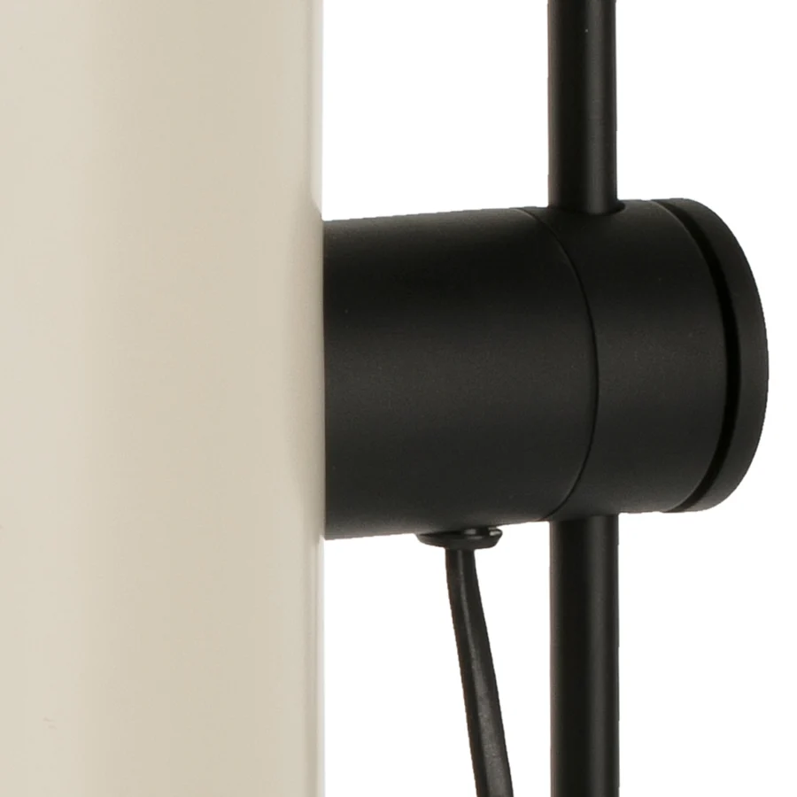 Table lamp by Faro Barcelona with white cylindrical diffuser and black metal support structure in matte finish adjustment