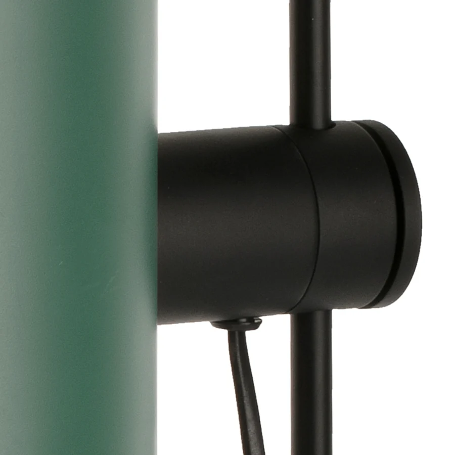 Table lamp by Faro Barcelona featuring metal frame and cylindrical green glass component with matte finish