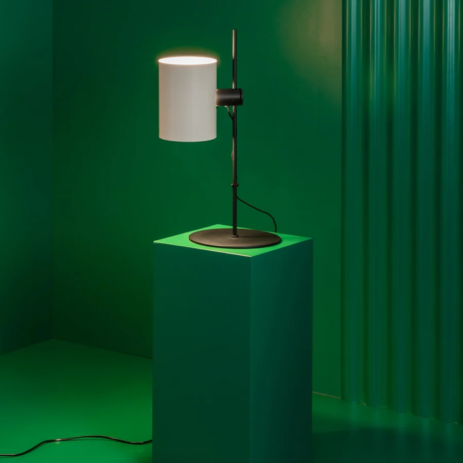 Table lamp by Faro Barcelona in metal with matte black stem base plus a white cylindrical shade for direct illumination