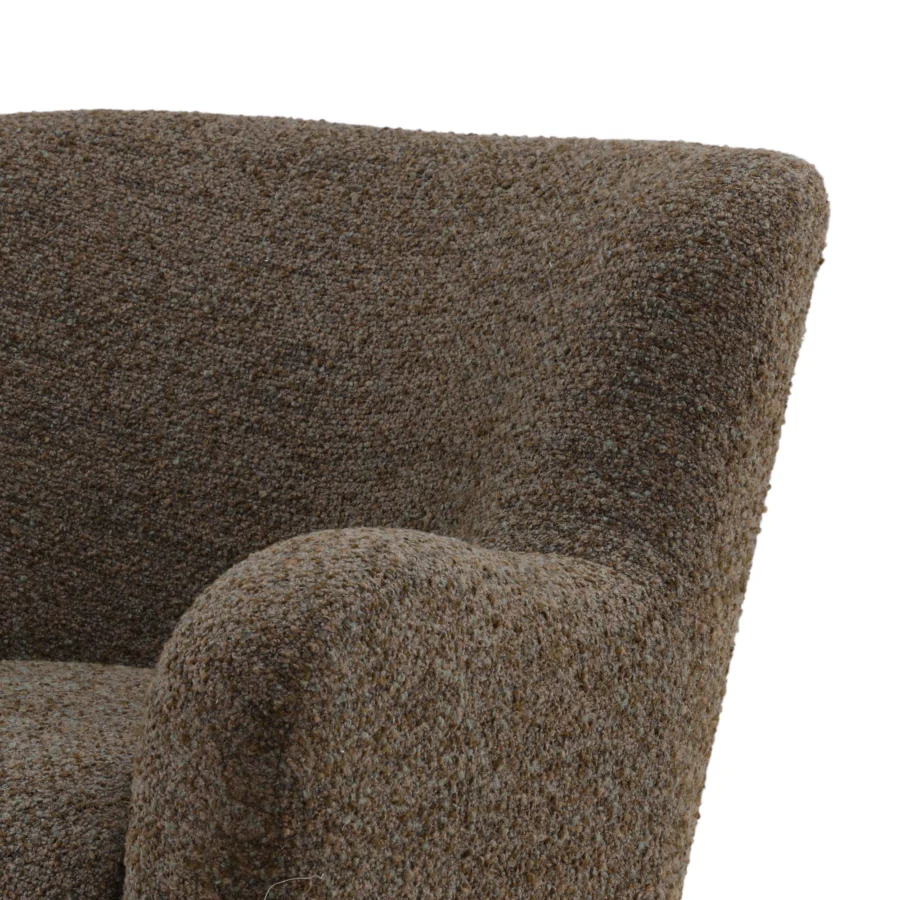 Lounge chair by Dovetail Zulia in deep heathered brown boucle fabric displaying rounded organic silhouette and nubby finish