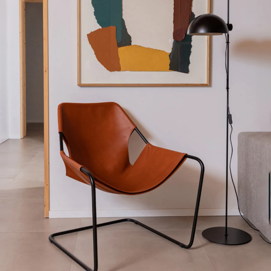 Floor lamp by Faro Barcelona in matte black metal with a slim vertical pole and a pivoting hemispherical shade