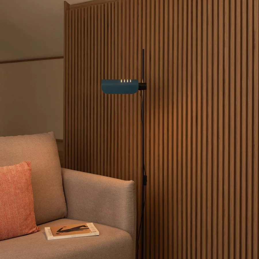 Floor lamp by Faro Barcelona in matte metal with blue semi-cylindrical shade, black vertical stem and circular base unit