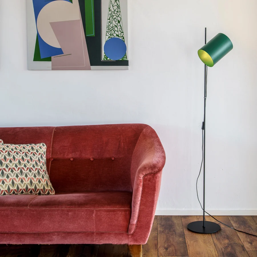 Floor lamp by Faro Barcelona in metal with matte dark finish and green cylindrical shade plus reflective inner surface