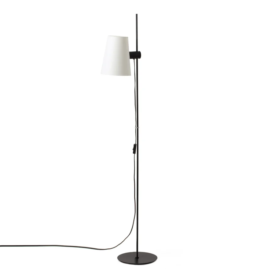 Floor lamp by Faro Barcelona in matte black metal with a white fabric shade, featuring an adjustable stem and tilting…