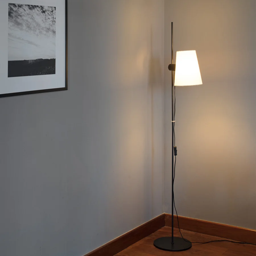 Floor lamp by Faro Barcelona Lupe in black metal with matte finish and truncated cone off-white fabric shade for lighting