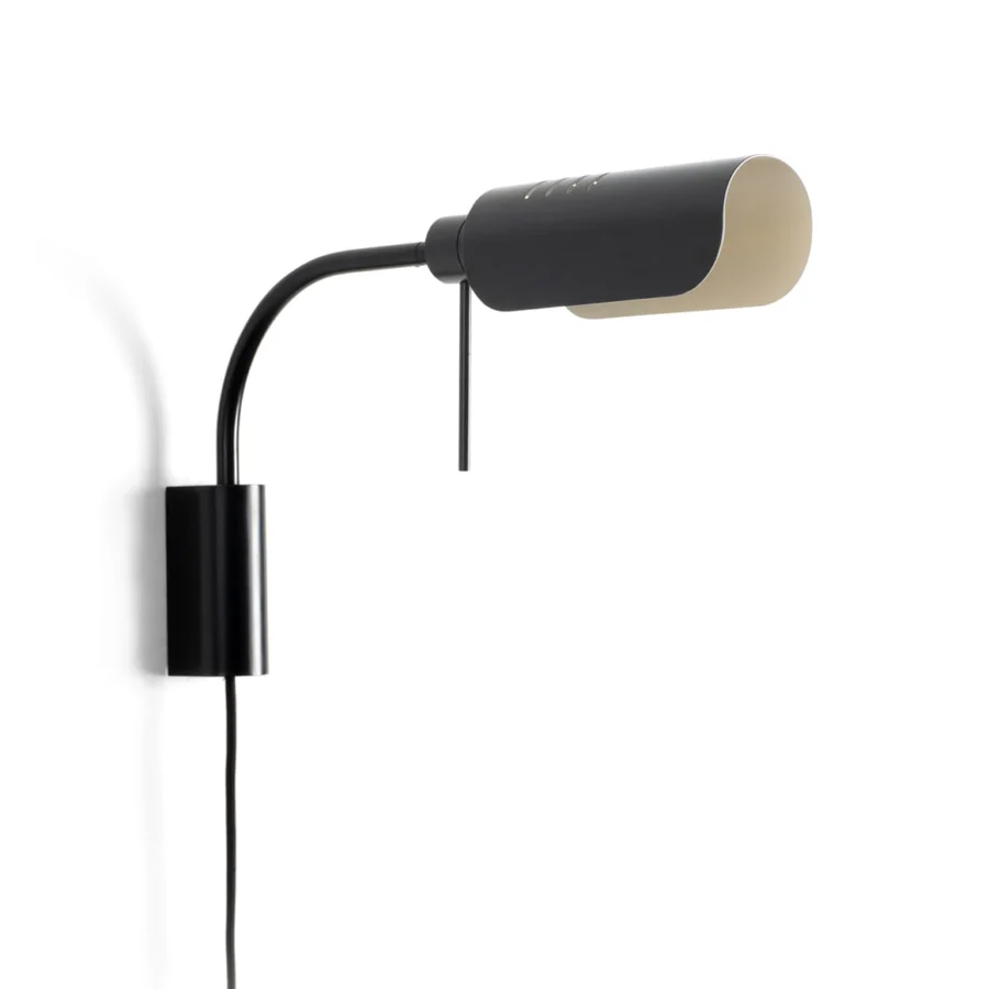 Lamp by Faro Barcelona in metal with matte black finish and off white interior shade featuring an articulated tubular arm…