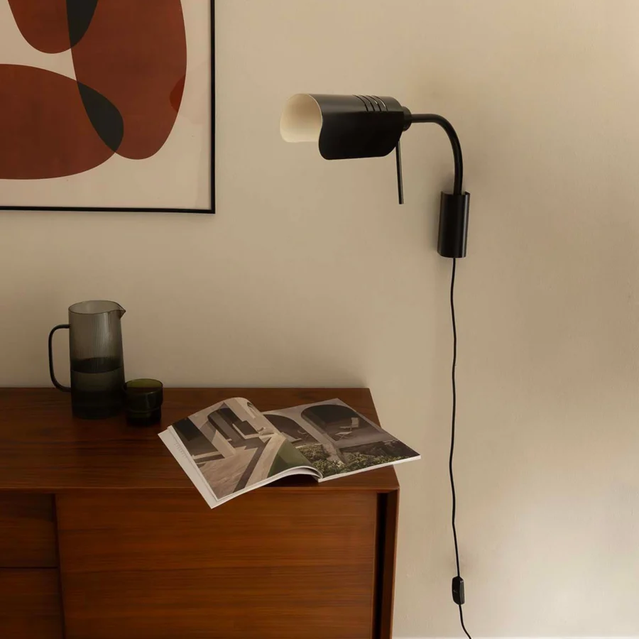 Wall lamp by Faro Barcelona in metal with matte black finish plus white interior shade, adjustable arm and vented cover