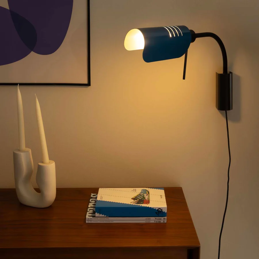 Wall lamp by Faro Barcelona in blue metal and matte black finish featuring an articulated arm and handle