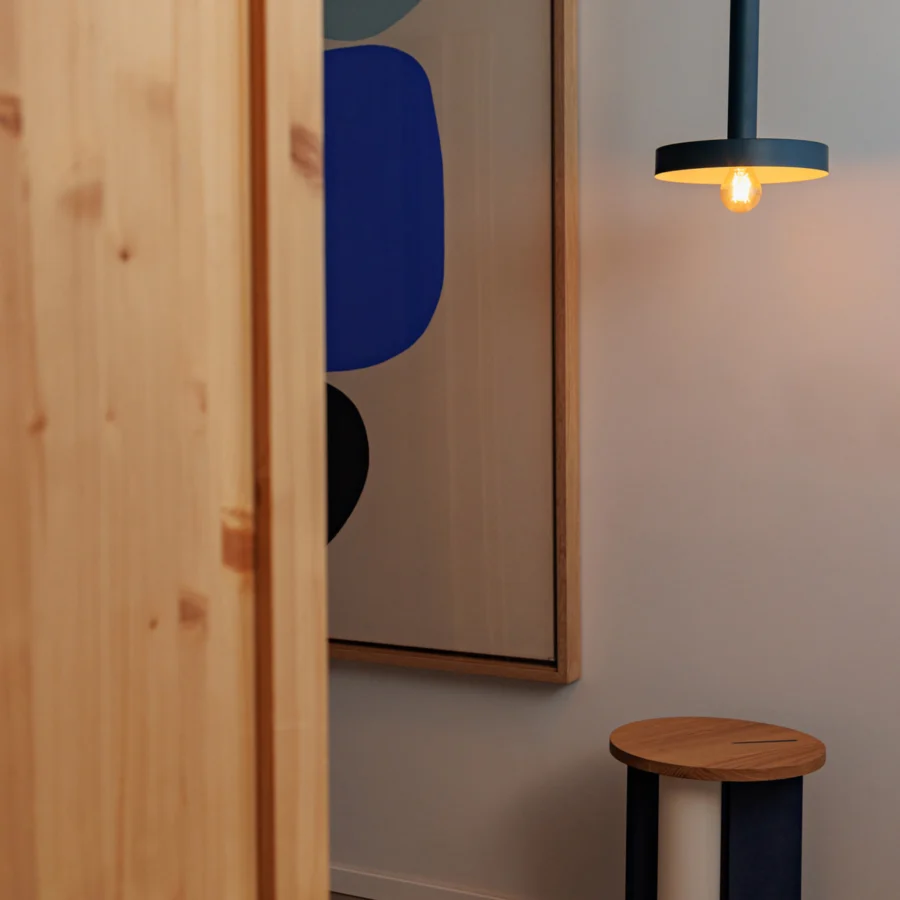 Suspension lamp by Faro Barcelona in dark blue metal with a matte finish and a gold interior featuring a cylindrical…