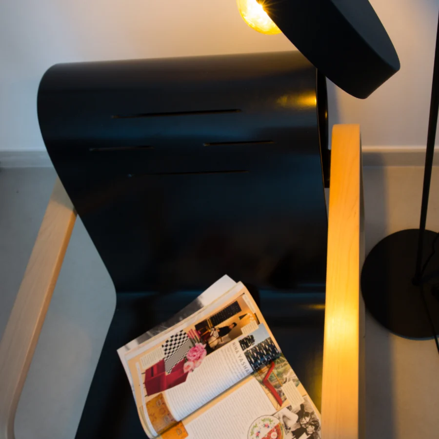 Floor lamp by Faro Barcelona in metal with matte black finish and circular base plus a rotating disk shaped light…