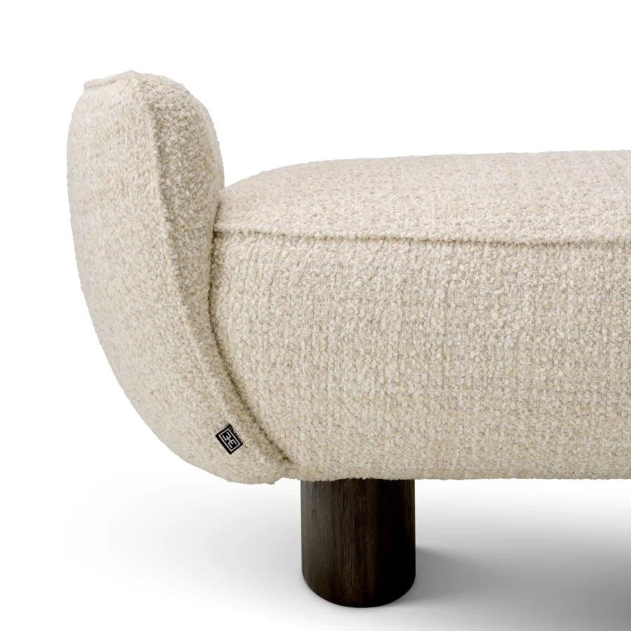 Bench by Eichholtz in neutral off-white Winslow chenille upholstery with a thick cushioned seat and charcoal leg finish