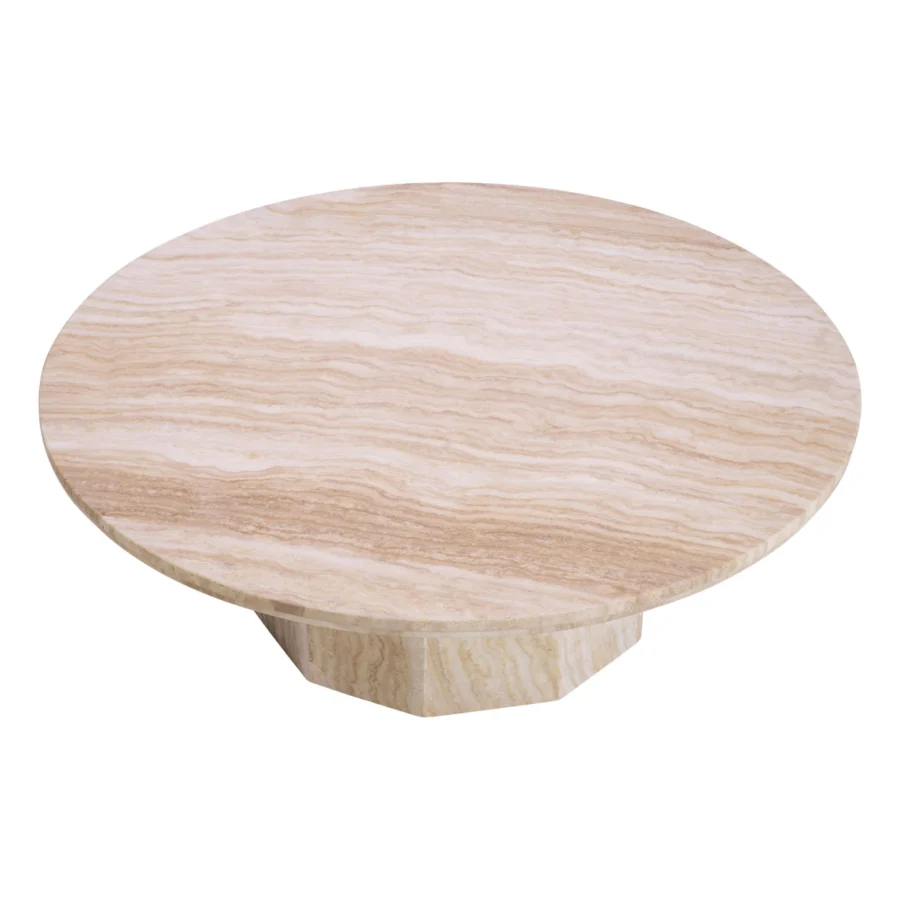 Coffee table by Eichholtz in travertine stone with smooth polished finish, featuring wide circular tabletop and faceted pedestal base