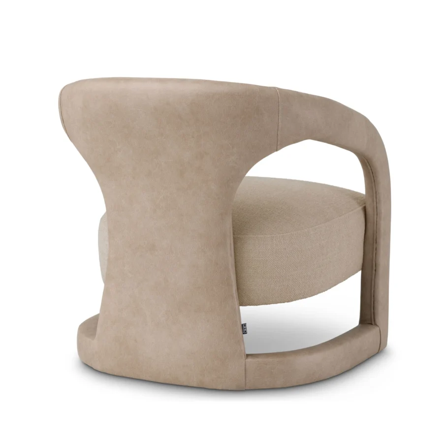 Lounge chair by Eichholtz in Renato ecru textured fabric with light taupe Valente faux aged grain leather wraparound base
