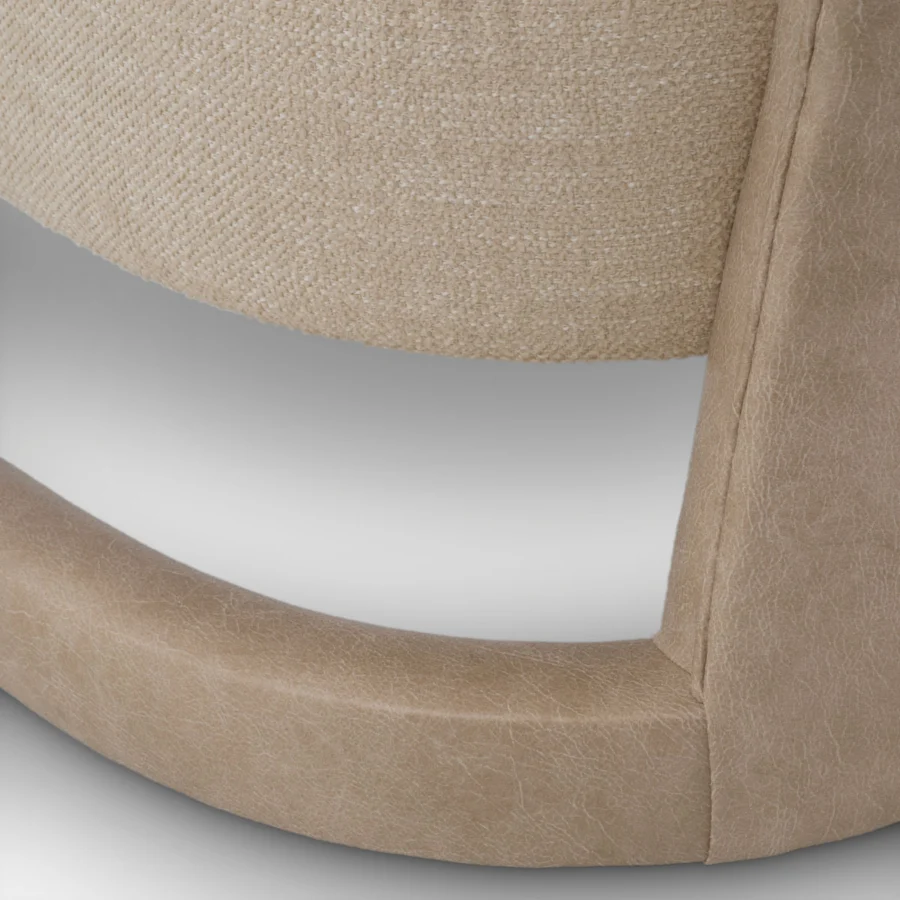 Lounge chair by Eichholtz in Renato ecru fabric and Valente faux leather with a wraparound sled base