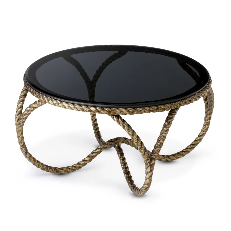 Coffee table by Eichholtz featuring a round smoked glass top and sculptural rope textured metal base in vintage brass finish